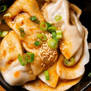 Dumplings in Chili Oil (8pc)
